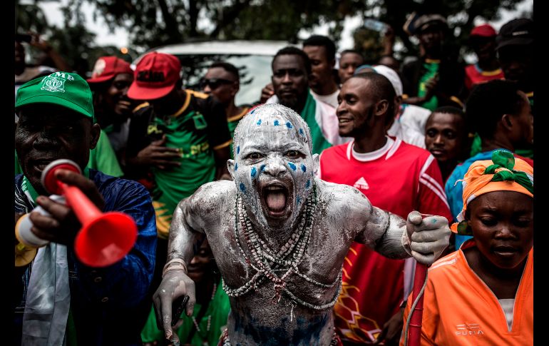 Seguidores de  Felix Tshisekedi, presidente electo de la República Democrática del Congo, echan porras al llegar a la ceremonia de su investidura en Kinshasa. AFP/J. Wessels