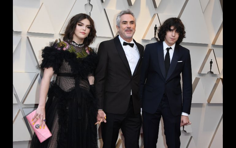 Alfonso Cuarón con sus hijos.