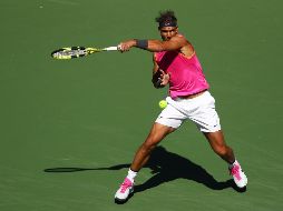 El rival de Nadal saldrá del partido entre John Isner y Karen Khachanov. AFP/C. Brunskill