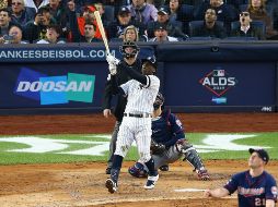 Didi Gregorius impulsó cuatro de las siete carreras que los Yankees consiguieron en la tercera entrada con un grand slam por todo el jardín central. AFP/M. Stobe