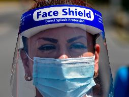 A Health worker of the La Raza Hospital wears a face shield and surgi