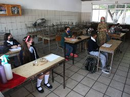 La excepción serán solo las escuelas que tengan grupos de más de 40 alumnos y cuyos espacios no cuenten con ventilación adecuada. XINHUA/ARCHIVO