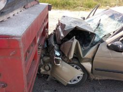 El conductor del vehículo quedó prensado entre los fierros a consecuencia del choque. CORTESÍA/PROTECCIÓN CIVIL TLAJOMULCO