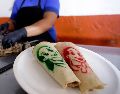 Esta taquería es la creadora del "taco Sheinbaum", el cual se puede degustar en el centro de Puebla. EFE/ Hilda Ríos