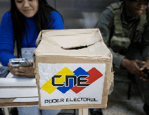 Personal del Consejo Nacional Electoral (CNE) participa en una jornada de información para las elecciones presidenciales de Venezuela. EFE / M. Gutierrez