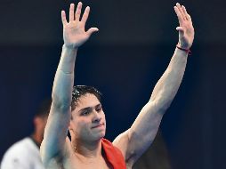 A pesar de ser doble medallista, Osmar Olvera sólo estaría recibiendo premio por haber ganado plata junto a Juan Manuel Celaya. AFP